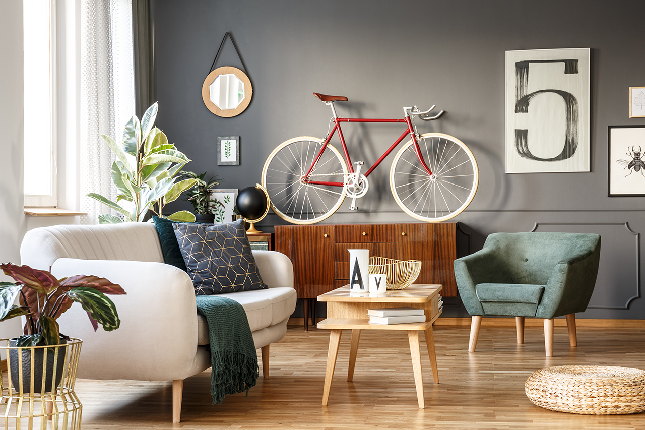Large livingroom with various hanging wall ornaments